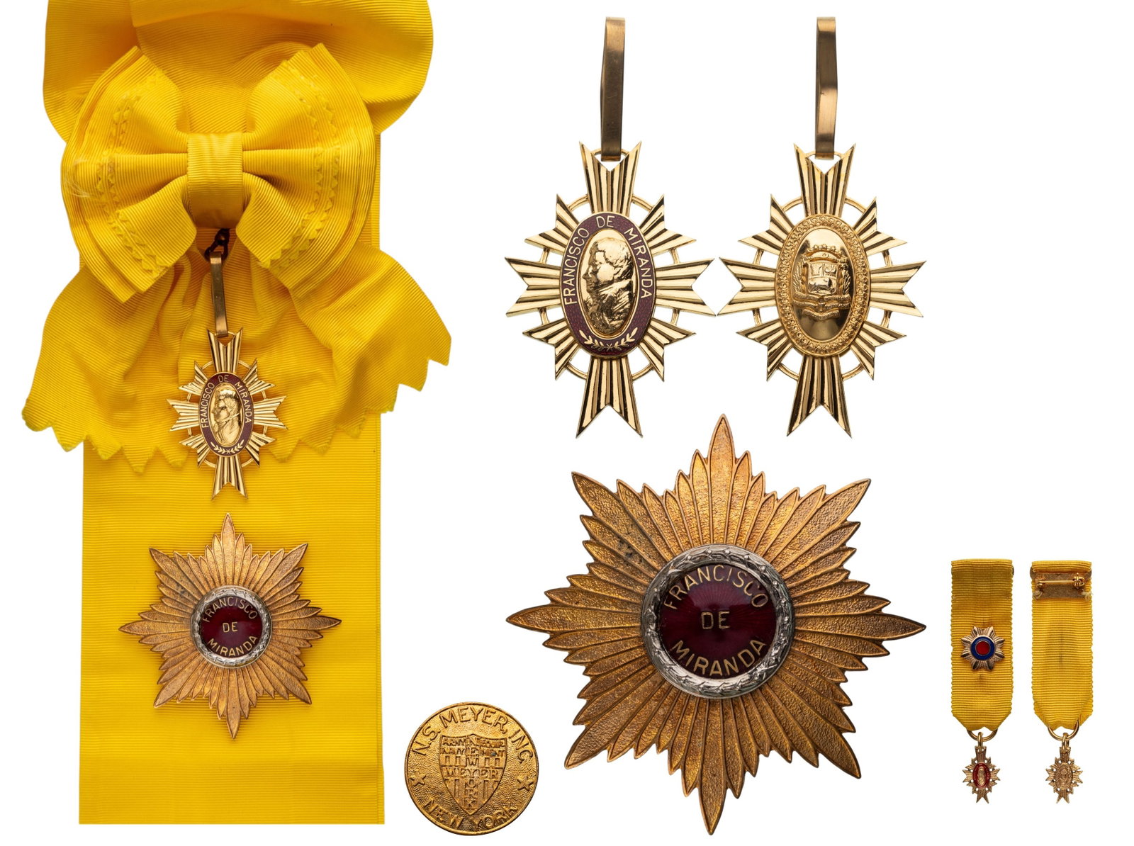 Order of Francisco de Miranda: Grand Cross Set, instituted in 1943. Sash Badge, 59x41 mm, gilt Bronze, one-side enameled, original suspension loop and sash. Breast Star, 76 mm, gilt Bronze, maker's mark "N.S Meyer, New York", centr