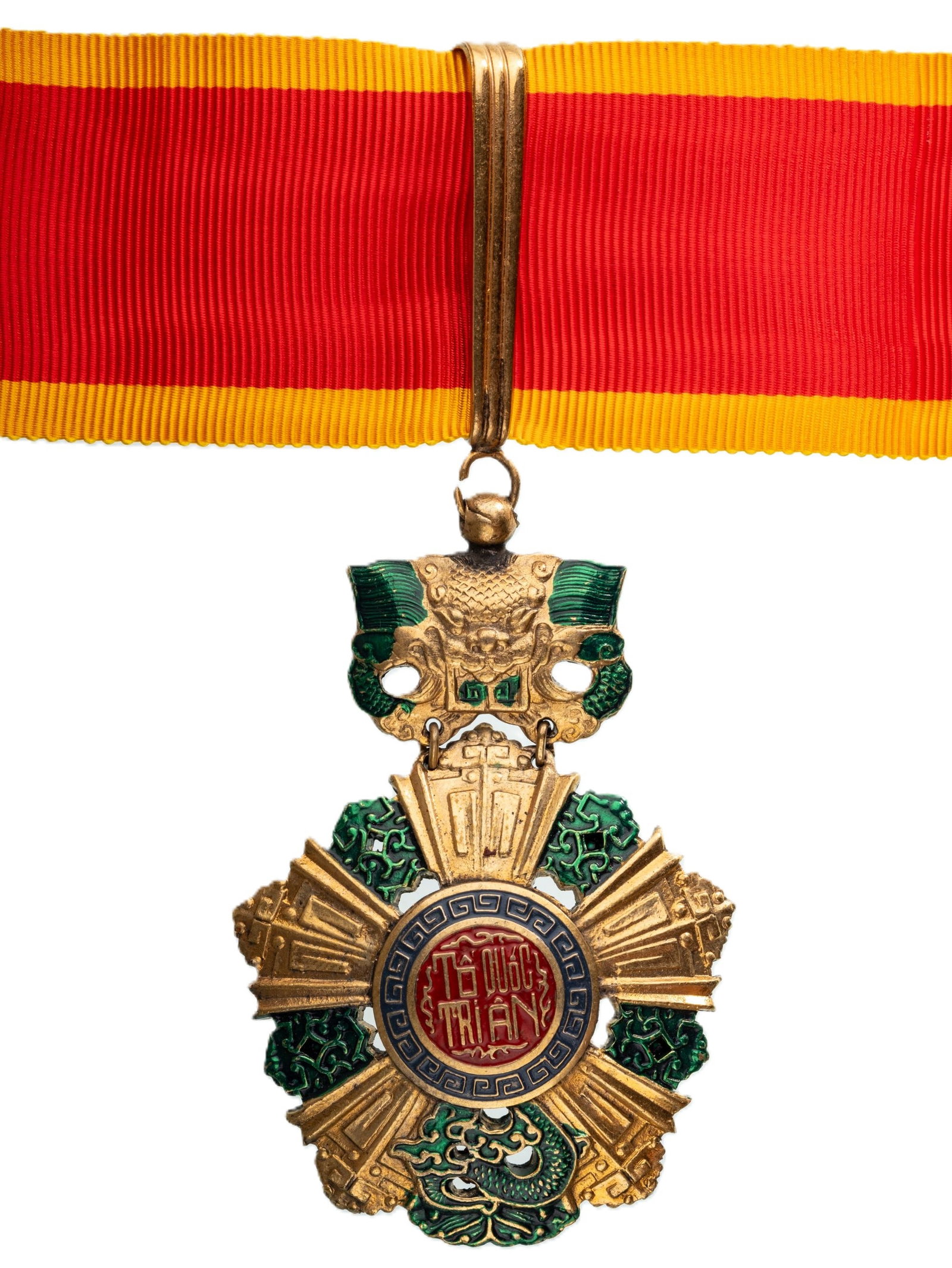 National Order of Vietnam (Báº£o Quá»?c HuÃ¢n ChÆ°Æ¡ng): Commander's Cross, 3rd Class, instituted in 1950. Neck Badge, 65x43 mm., gilt Bronze, original suspension ring, loop and ribbon. A badge, in extremely fine condition! I