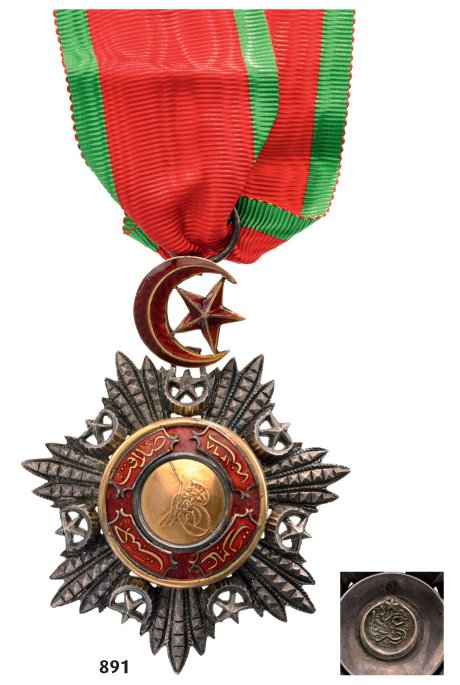 ORDER OF MEDJIDJIE: Country: TURKEY Commander's Cross, 3rd Class, instituted in 1852. Neck Badge, 65x58 mm, silver with brilliant cut rays, maker's mark by the Turkish Mint, central medallion GOLD, enameled, original ena