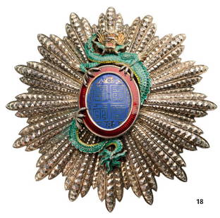 ORDER OF THE DRAGON OF ANNAM: Country: ANNAM Breast Star, silver with brilliant cut rays, 106x105 mm, French hallmark, maker's mark "Arthus Bertrand, Paris" on the back, central medallion silver gilt, enameled, reverse with long