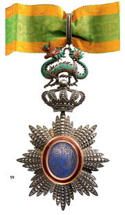 ORDER OF THE DRAGON OF ANNAM: Country: ANNAM Commander's Cross, 3rd Class, instituted in 1886. Neck Badge, 72x70 mm, silver with brilliant cut rays, partially repierced, central medallion silver gilt, enameled, original dragon