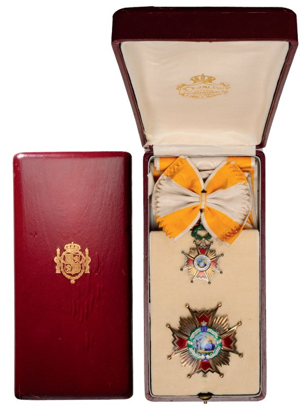 ORDER OF ISABELLA THE CATHOLIC: Grand Cross Set, instituted in 1815. Sash Badge, 67x43 mm, silver gilt, multipart construction, central medallion gilt, enameled, with original laurel wreath suspension device and long sash. Breast St