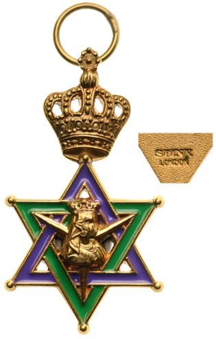 ORDER OF THE QUEEN OF SHEBA: Country: ETHIOPIA Badge Miniature, 1st Class, instituted in 1922. Breast Badge, 19 mm, gilt Bronze, one side enameled, by "Spink, London", original suspension ring. Very attractive and scarce! I R!