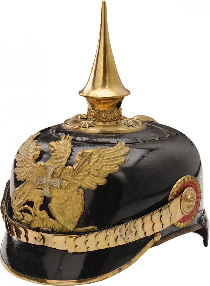 Reserve officer Pickelhaube: Body made in black leather brass gilt chinstrap spiked for officer with pearl ring on round base in brass gilt Baden gripping gilded brass and tin plate reserve cross Baden rosette and Reich for offic