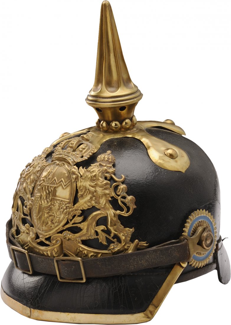 Cavalry enlisted Pickelhaube WW I: Body made in black leather fluted spiked with pearl ring on cruciform base in brass Bayern brass badge with lion emblem and coat of arms with crown made of brass with text: IN TREUE FEST black leather
