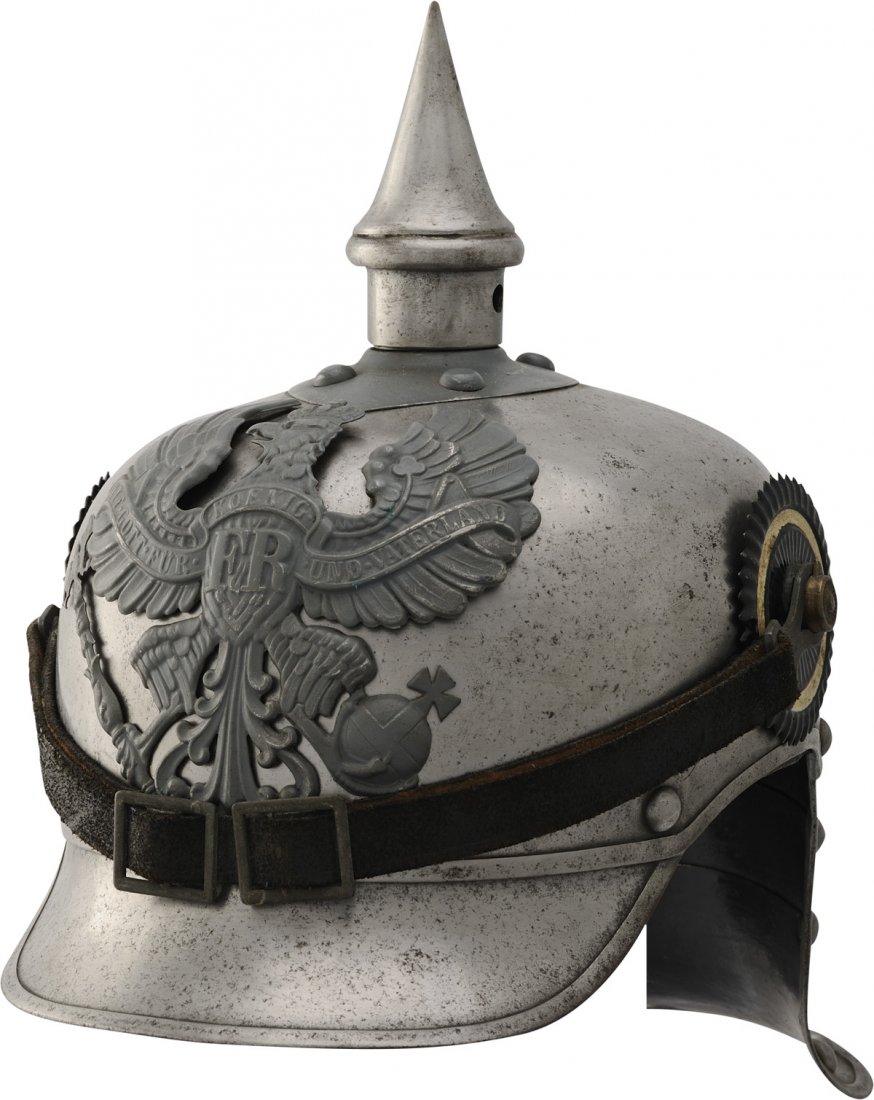 Curassier enlisted "lobster tail" md. 1916: This helmet features a polished steel finish to its body the spike is attached to aovoid shaped design enlisted base plate the wappenshield front plate is silvered matching the body and features the I