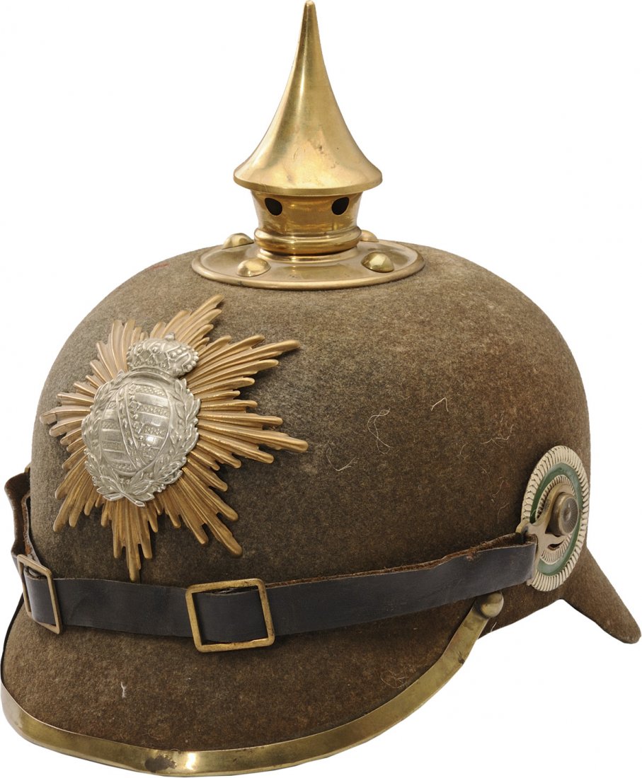 Private enlisted Infantry Pickelhaube md. 1916: Body made in field gray felt with brass spicked black leather jugular star of brass plate with applied coat of arms of tin plate rosette Saxony and Reich for soldiers leather liner. II