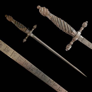 An Italian Gunners, Artilleryman's Stiletto Dagger, late 17th century.: An Italian Gunners, Artilleryman's Stiletto Dagger, late 17th century. The triangular blade marked to one side, the cross-guard with iron fluted quillons, the spirally turned horn grip with a fluted