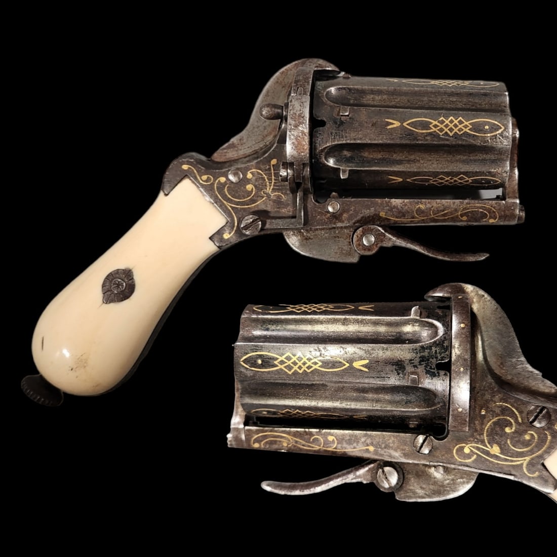 Revolver Belgian "Pepperbox" for pin-fire cartridge.: Revolver Belgian "Pepperbox" for pin-fire cartridge. Marks of the Liege arms manufactory. Inlaid with gold, bone handle. Length - 13cm