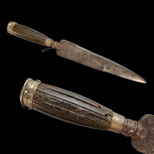 A Italian hunting knife, late 18th C., with engraving on the blade, horn handle in a silver: A Italian hunting knife, late 18th century, with engraving on the blade, horn handle in a silver mounting. Length 33 cm.