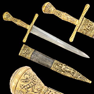 A magnificent 19th century French hunting dagger in the Renaissance style.: A magnificent 19th century French hunting dagger in the Renaissance style. The massive double-edged steel blade has a facet in the middle. The metal parts of the handle and scabbard are made of gilded