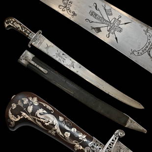 A high quality hunting sword, with silver inlay and Kabbalistic spells on the blade, Germany, 18th: A high quality hunting sword, with silver inlay and Kabbalistic spells on the blade, Germany, 18th C. The wide, slightly curved blade is decorated with engraved Kabbalistic spells and military attribu