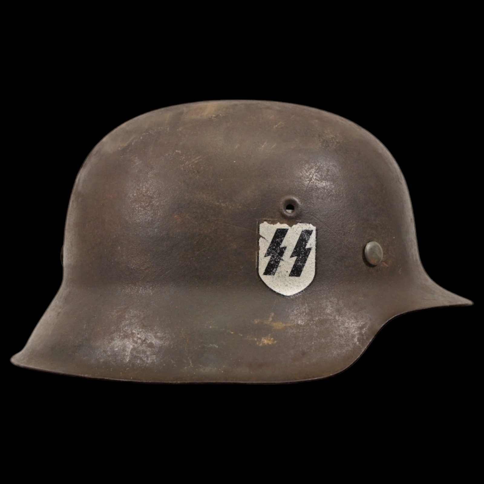 WWII Nazi German M42 SS Combat Helmet with SS runes emblem on the side.: WWII Nazi German M42 SS Combat Helmet with SS runes emblem on the side. The helmet shows signs of wear and has a well-preserved, original SS decal. The helmet retains its liner, adding to its authenti