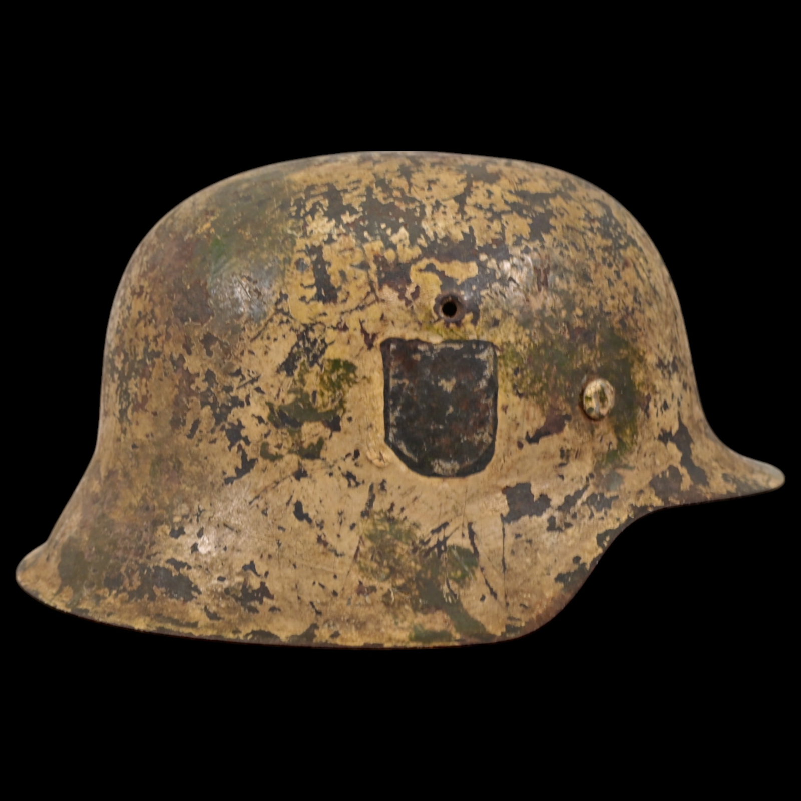 WWII Nazi German M42 Waffen - SS Combat Helmet with SS emblem on the side, liner.: WWII Nazi German M42 Waffen - SS Combat Helmet with SS emblem on the side, liner. The emblems SS on the right side of the helmet. The helmet has a matt tropical paint finish to the exterior of the she