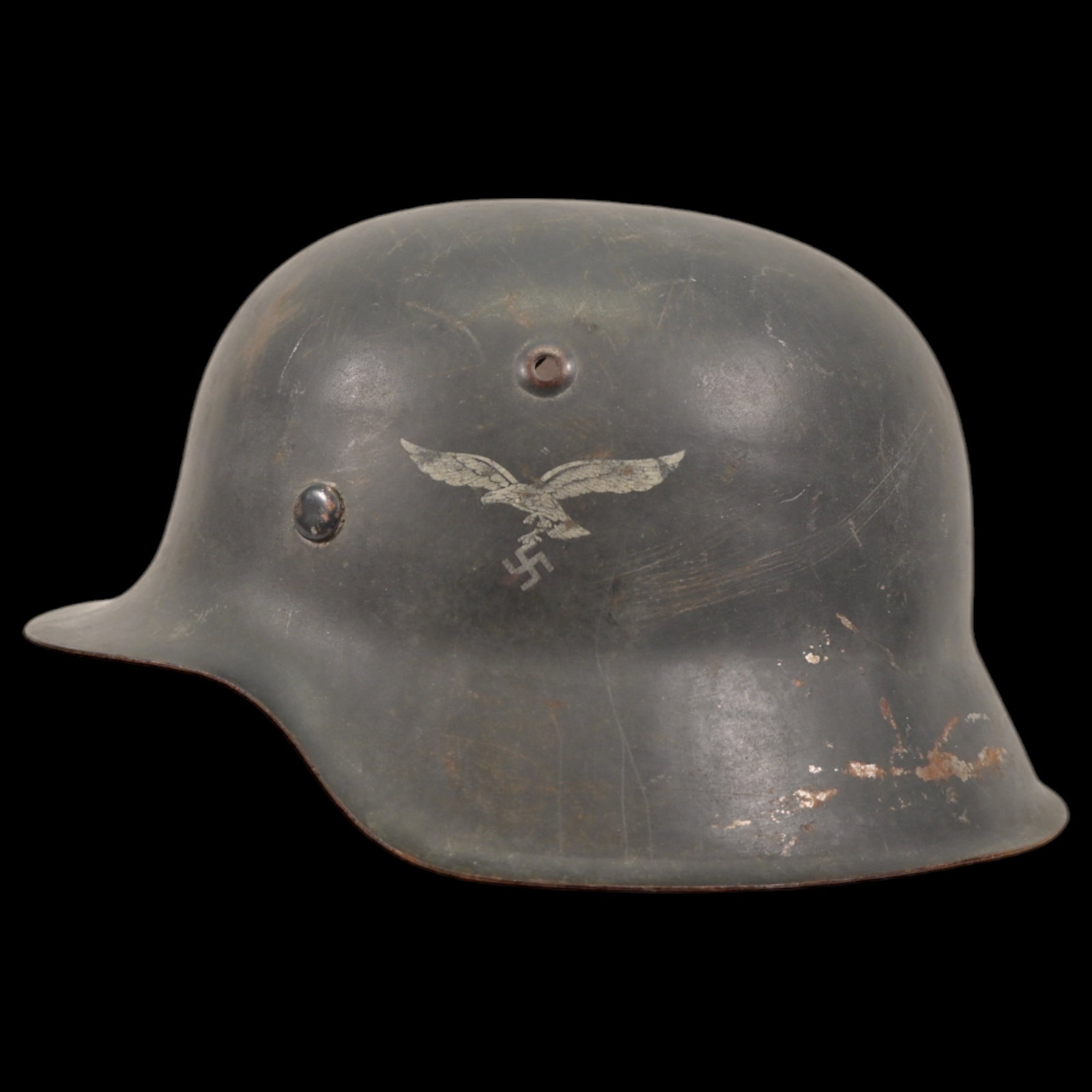 WWII Nazi German M42 Luftwaffe Combat Helmet with Luftwaffe eagle emblem and Liner.: WWII Nazi German M42 Luftwaffe Combat Helmet with Luftwaffe eagle emblem and Liner. The emblem is well preserved. The helmet retains of its original paint and exhibits authentic signs of battlefield w