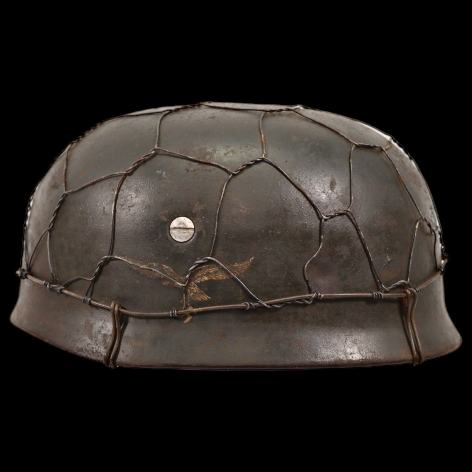 WWII Nazi German M38 Luftwaffe Paratrooper Helmet with metal mesh for attaching camouflage.: WWII Nazi German M38 Luftwaffe Paratrooper Helmet with metal mesh for attaching camouflage. This rare helmet features a well-preserved Luftwaffe emblem on the side, partially visible through the metal