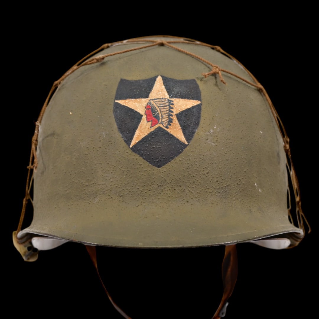 WWII US Army original M1 Infantry Helmet, complete with the 2nd Infantry Division Officer Emblem.: WWII US Army original M1 Infantry Helmet featuring a fixed bale shell and liner, complete with the 2nd Infantry Division Officer Emblem. The fixed bale design and original liner contribute to its coll