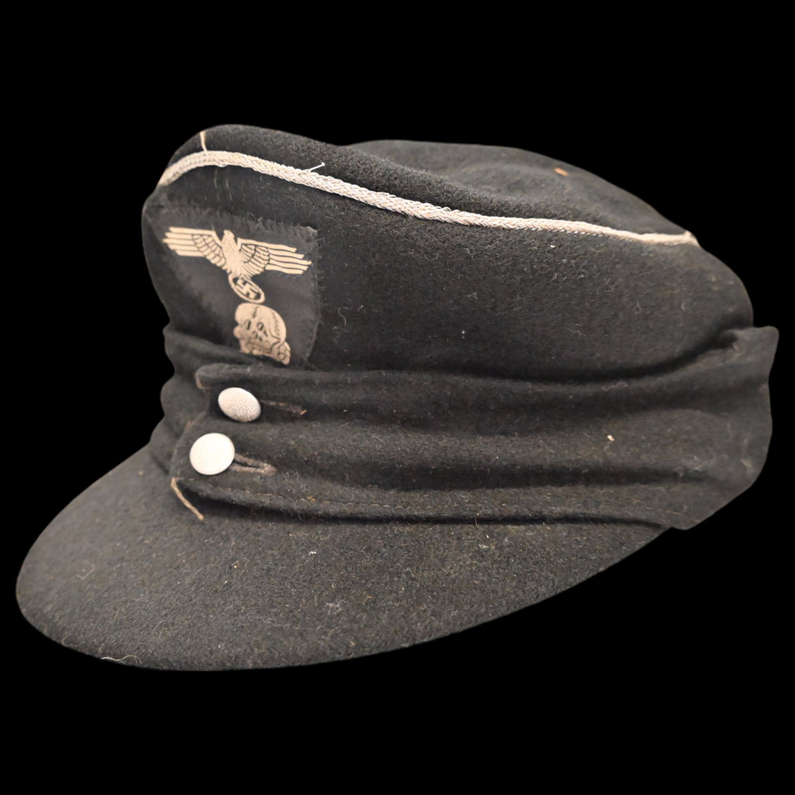 Rare WWII Nazi German Panzer SS M43 Officer Cap, ranks of SS-Oberführer to Reichsführer-SS.: Rare WWII Nazi German Panzer SS M43 Officer Cap, ranks of SS-Oberführer to Reichsführer-SS. The front center of the cap has, single piece SS cap insignia trapezoid. The insignia consists of a woven 