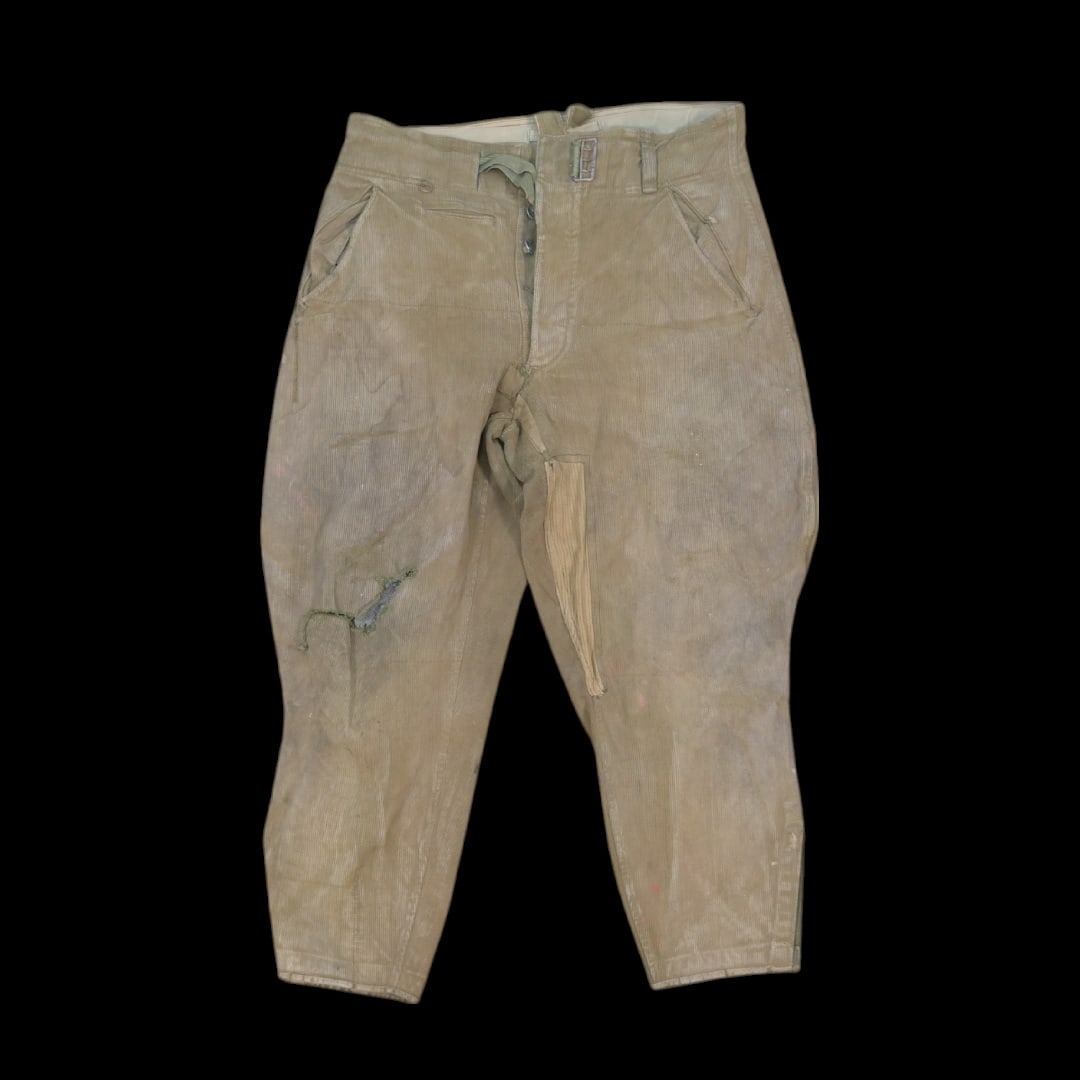 Rare WWII Nazi German, DAK, Deutsche Afrika Korps, pair pants M42, sand corduroy.: Rare WWII Nazi German, DAK, Deutsche Afrika Korps, pair pants M42, sand corduroy. The four pockets include two diagonally slash pockets at sides, a watch pocket at front, and single right rear buttone