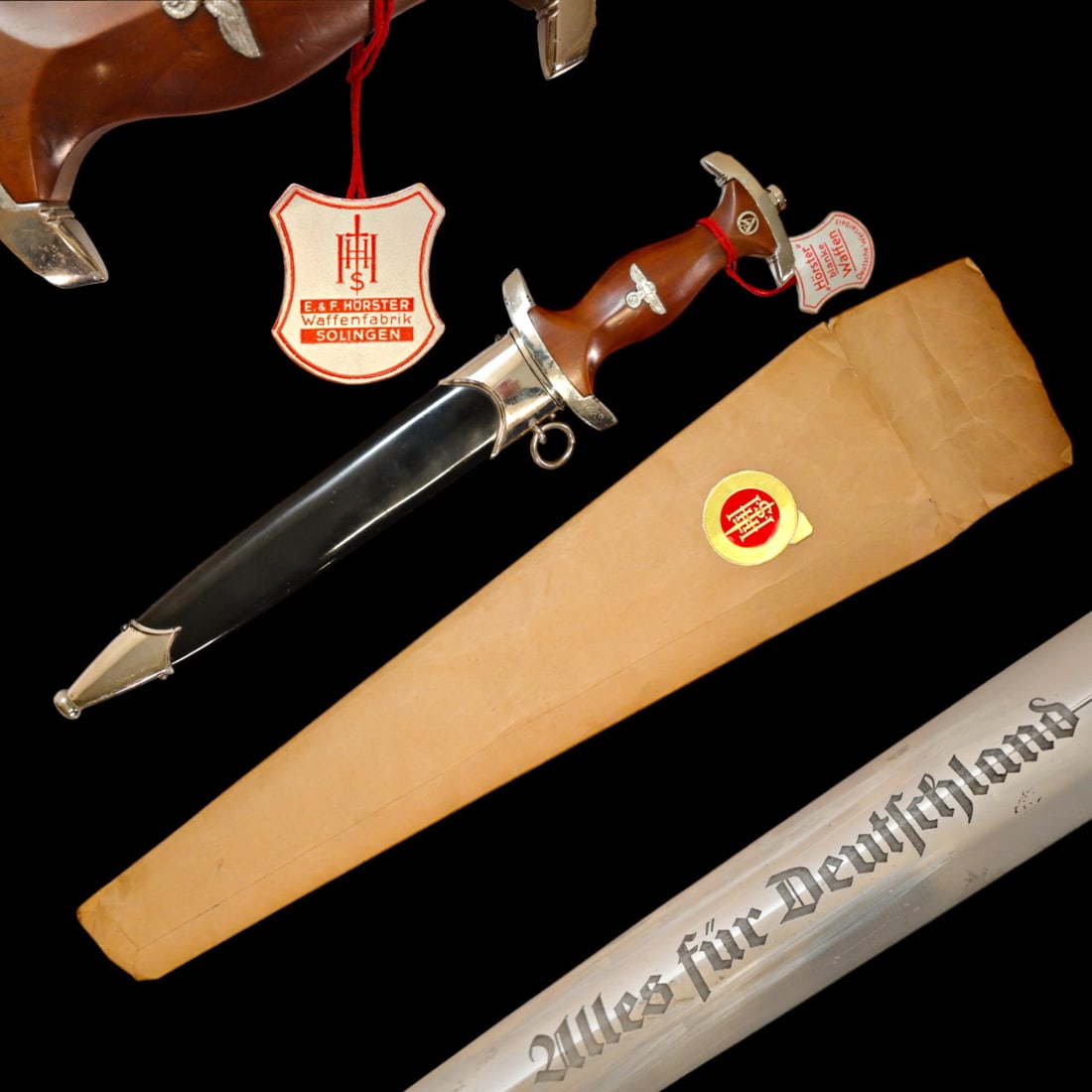 Extra rare WWII Nazi German dagger of the NSKK by Hörster in the original manufacturer's packaging.: Extra rare WWII Nazi German dagger of the NSKK by Hörster in the original manufacturer's packaging. A Nationalsozialistisches Kraftfahrkorps (National Socialist Motor Corps/NSKK) Model 1933 Service D