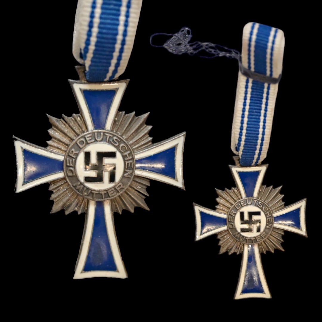 WWII Nazi German, Cross of Honor of the German Mother, Silver Class, 1939-1945.: WWII Nazi German, Cross of Honor of the German Mother, Silver Class, 1939-1945. Cross is a slender elongated form of the Iron Cross and very similar in design to the Marian Cross of the Teutonic Order