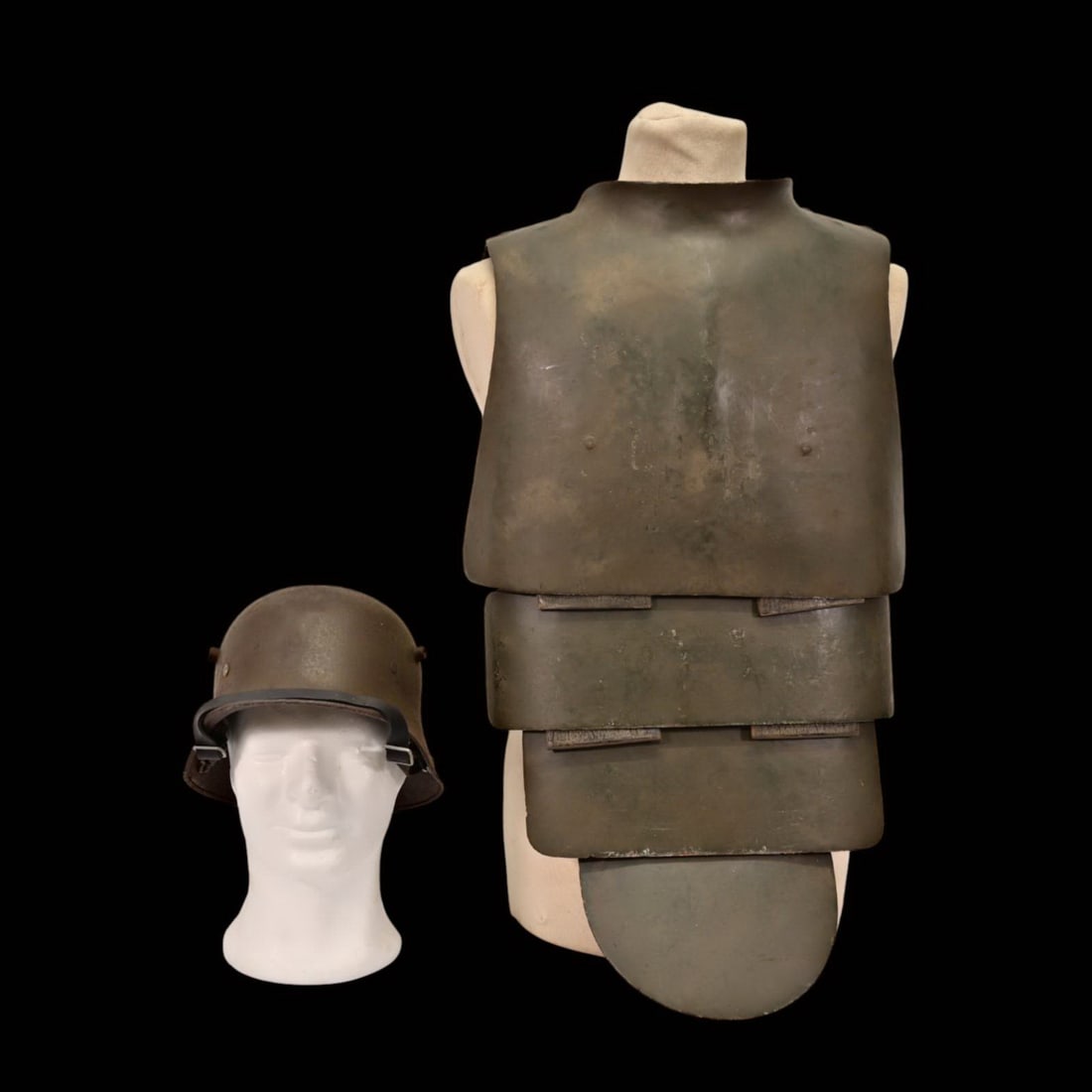 Rare German WWI Trench Armor Set (Sappenpanzer and Stahlhelm M1916), ca. 1916 - 1918.: Rare German WWI Trench Armor Set (Sappenpanzer and Stahlhelm M1916), ca 1916 - 1918. A rare and complete example of the Sappenpanzer steel body armor issued to German stormtroopers (Sturmtruppen) and 