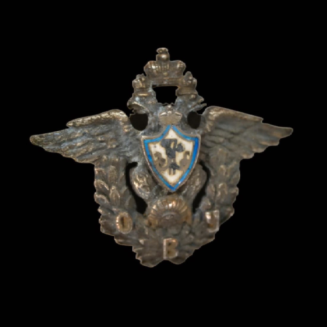 Miniature Badge of the Odessa Military School, Imperial Russia, early 20th century.: Miniature Badge of the Odessa Military School Imperial Russia, early 20th century. A rare badge of the Odessa Military School, Imperial Russia, early 20th century. The badge is finely crafted in silve