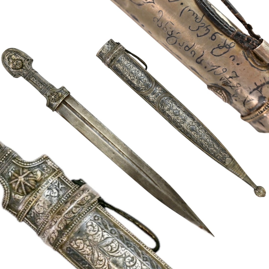 A Fine and Rare Georgian Silver and Niello-Mounted Kama Dagger, Dated 1920.: A Fine and Rare Georgian Silver and Niello-Mounted Kama Dagger, Dated 1920. This refined example of a Georgian kindjal, epresents the exceptional craftsmanship of the Transcaucasian region during the 