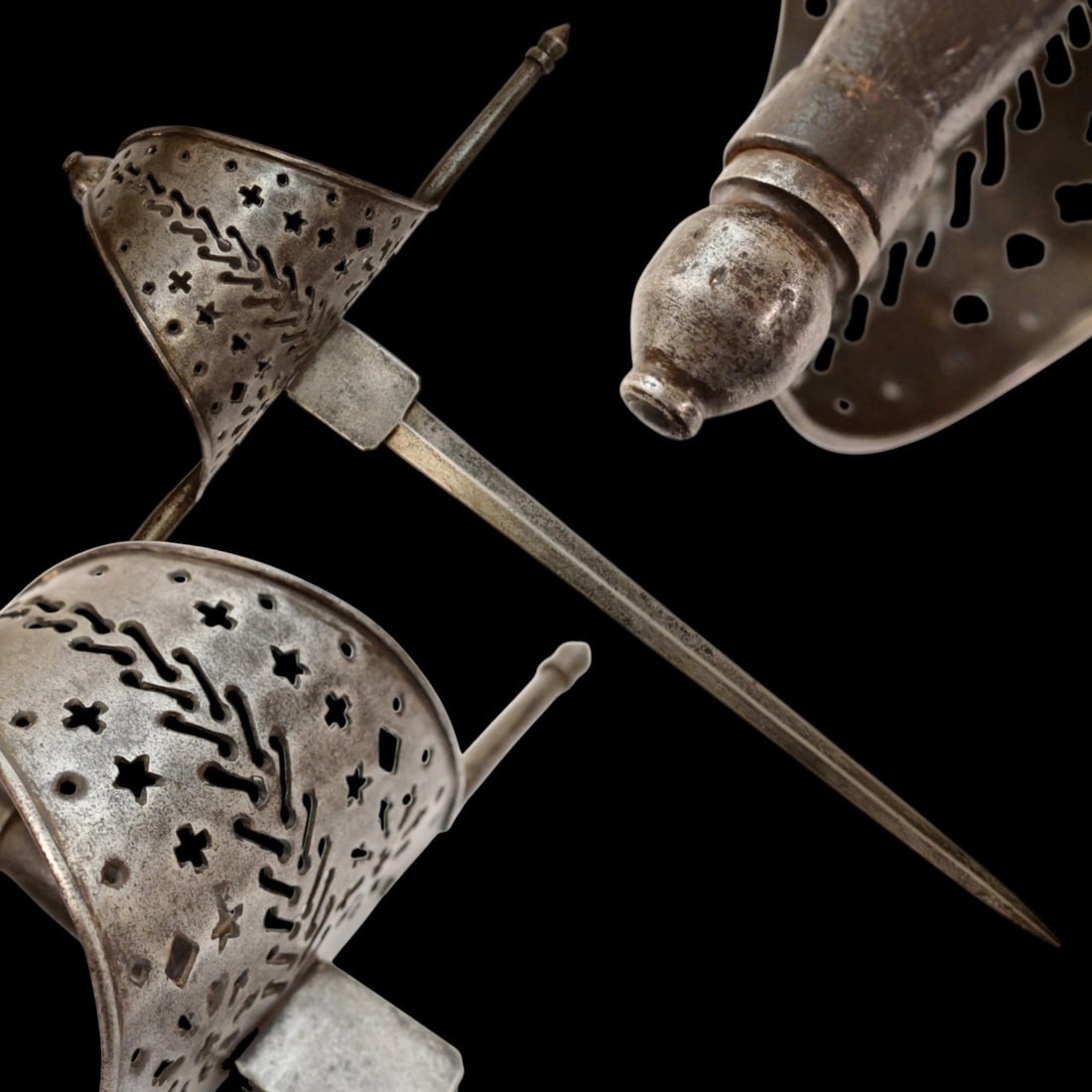 A beautiful Left-hand dagger, Spain, 18th century.: A beautiful Left-hand dagger, Spain, 18th century. Straight, double-edged blade. Guard of classical for Spanish Left-hand dagger shape. Exquisitely decorated with perforated patterns in geometric styl