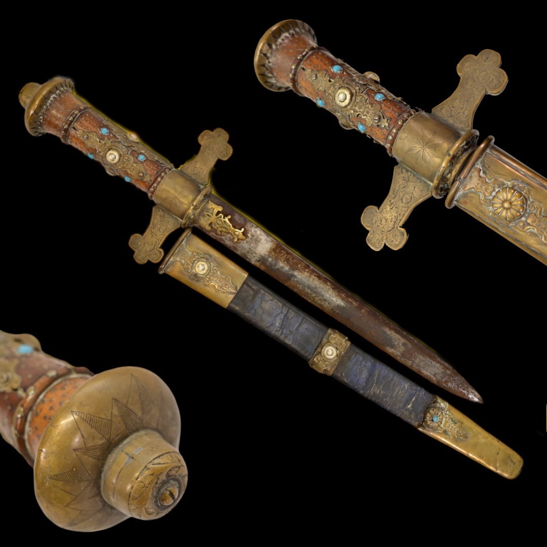 A Ceremonial dagger inlaid with stones, France 19th century.: A Ceremonial dagger inlaid with stones, France 19th century. Straight double-edged blade. The hilt consists of a wooden handle inlaid with brass nails and stones and brass guard and pommel. The guard 