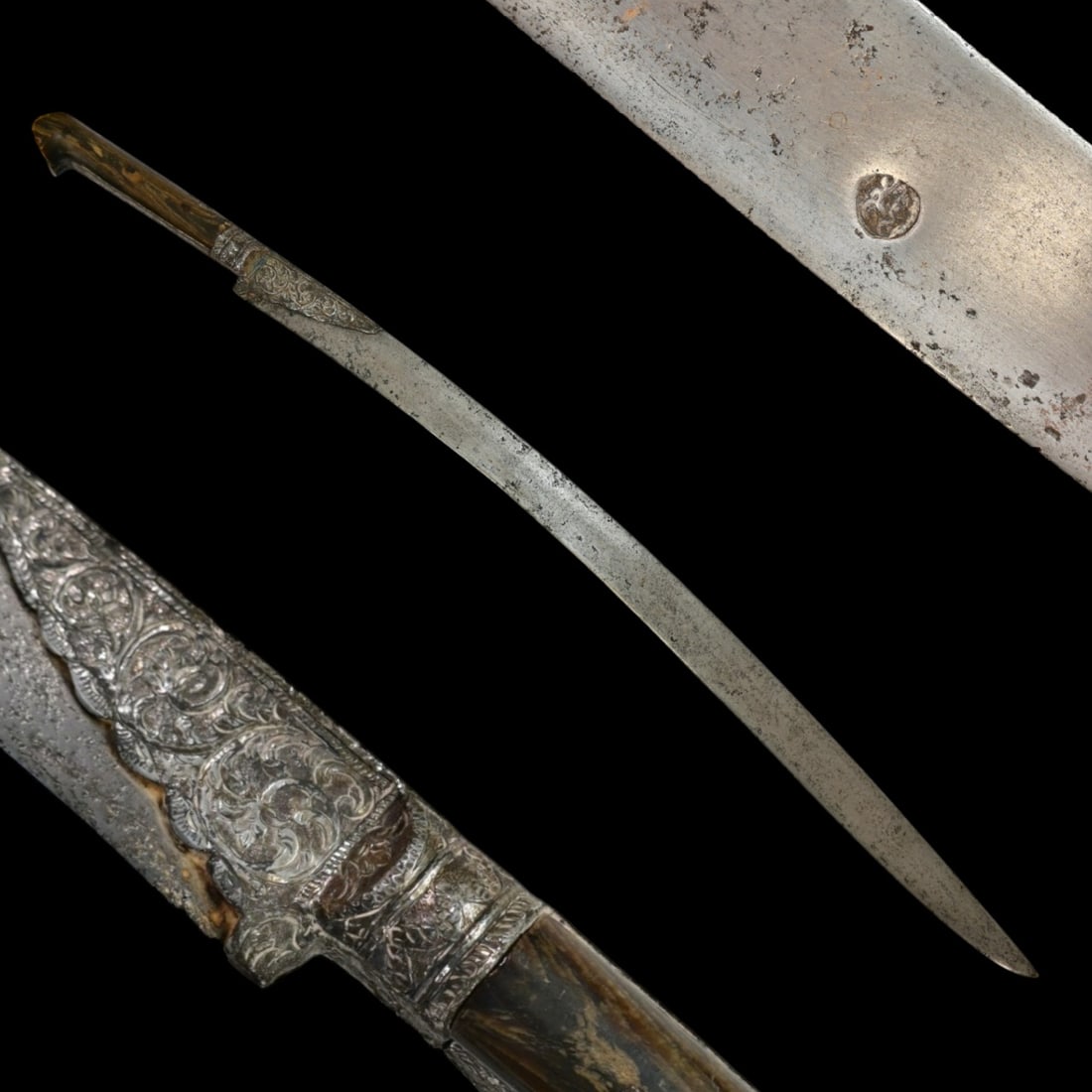 An Ottoman Silver-Mounted Yataghan with Horn Grip, 18th/19th Century.: An Ottoman Silver-Mounted Yataghan with Horn Grip, 18th/19th Century. This imposing Ottoman yataghan, dating to the late 18th or early 19th century, serves as a example of the signature sidearm favore
