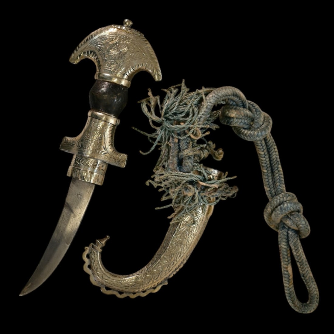 A North African White Metal-Mounted Dagger (Koummya), 19th Century.: A North African White Metal-Mounted Dagger (Koummya), 19th Century. This 19th-century Koummya serves as a refined example of traditional Berber craftsmanship from the North African Maghreb. The dagger