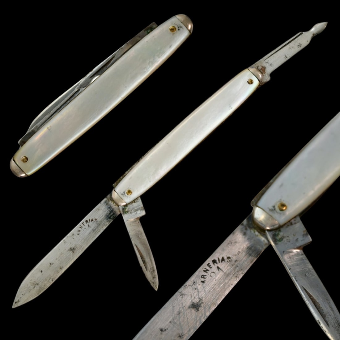 An Early 20th Century Mother-of-Pearl Mounted Folding Pocket Knife by Arnerias.: An Early 20th Century Mother-of-Pearl Mounted Folding Pocket Knife by Arnerias. This refined folding pocket knife, dating from the early 20th century, exemplifies the elegant utility of Edwardian-era 