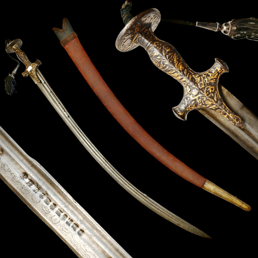 A rare 18th-century Indian Talwar with an imitation Eastern European blade, and a gold kofgari hilt. (1 of 9)