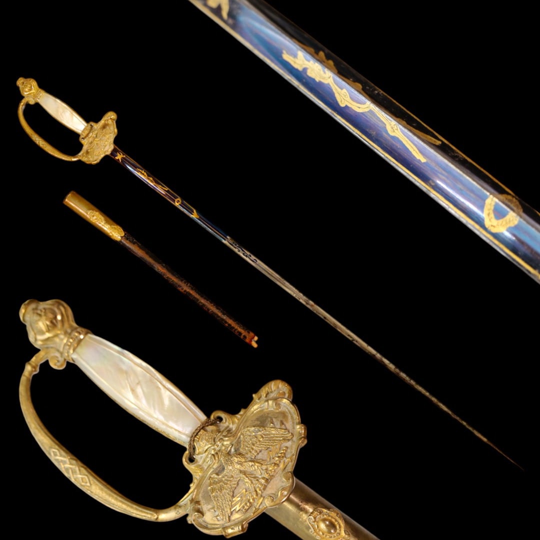 French Smallsword of the Officer of the Powder Department, model 1852.: French Smallsword of the Officer of the Powder Department, model 1852. Incurved triangular section blade, engraved and gilded on its first third with military trophies and floral decorations, with a b