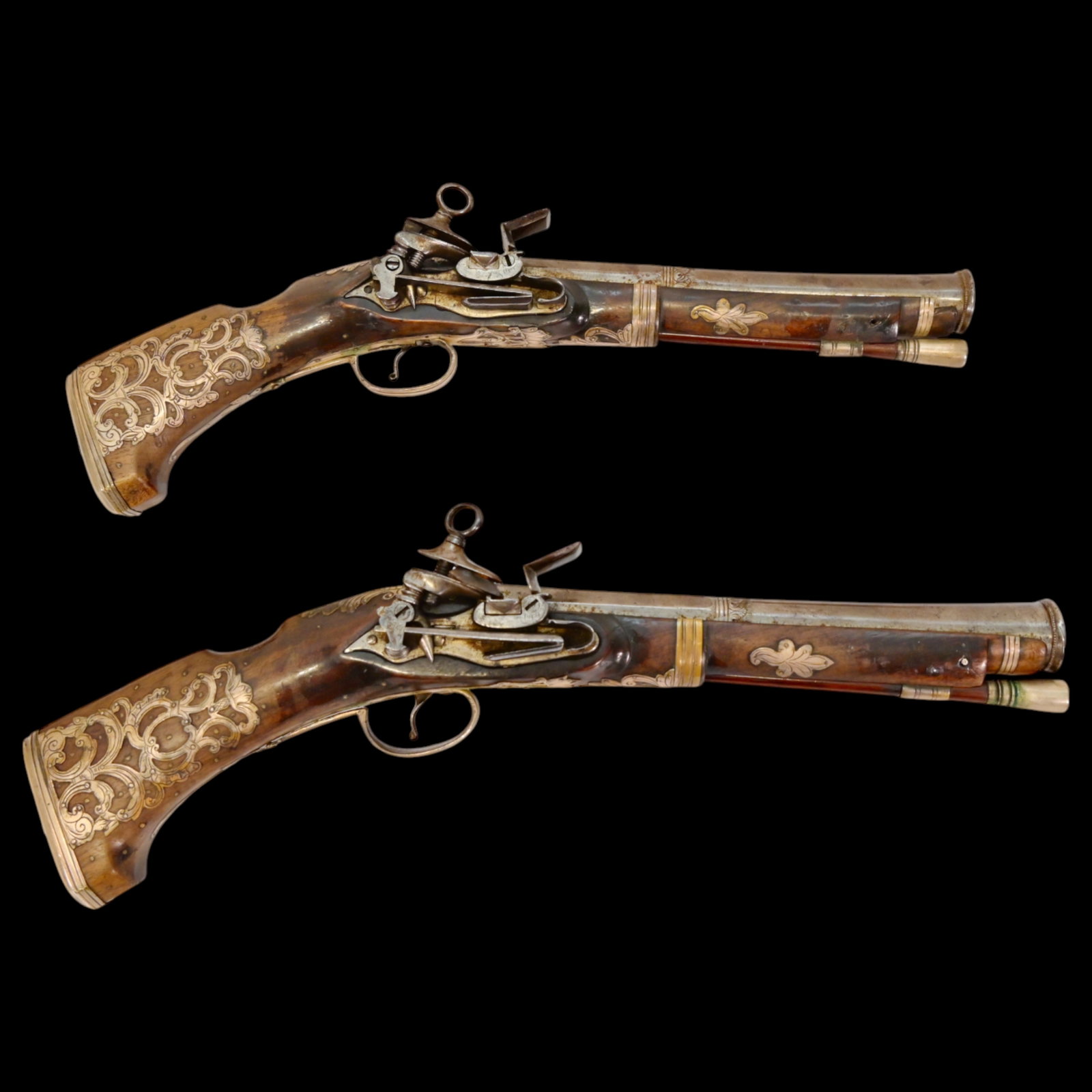 A Magnificent Pair of Flintlock Musketoons, Spain, Catalonia, Second of the 17th Century.: A Magnificent Pair of Flintlock Musketoons, Spain, Catalonia, Second of the 17th Century. A superb and exceptionally well-preserved pair of short flintlock musketoons, masterfully crafted in Catalonia