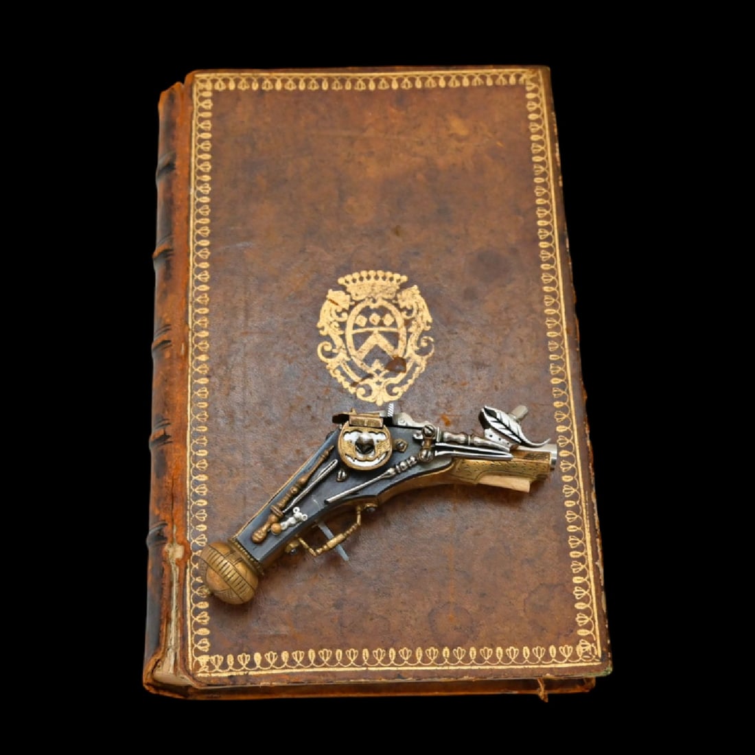 A very rare miniature model of a wheel-lock pistol (Puffer), Germany, 16th-19th centuries.: A very rare miniature model of a wheel-lock pistol (Puffer), Germany, 16th-19th centuries. This exquisite miniature model of a German wheel-lock pistol, commonly known as a "Puffer," represents a mast