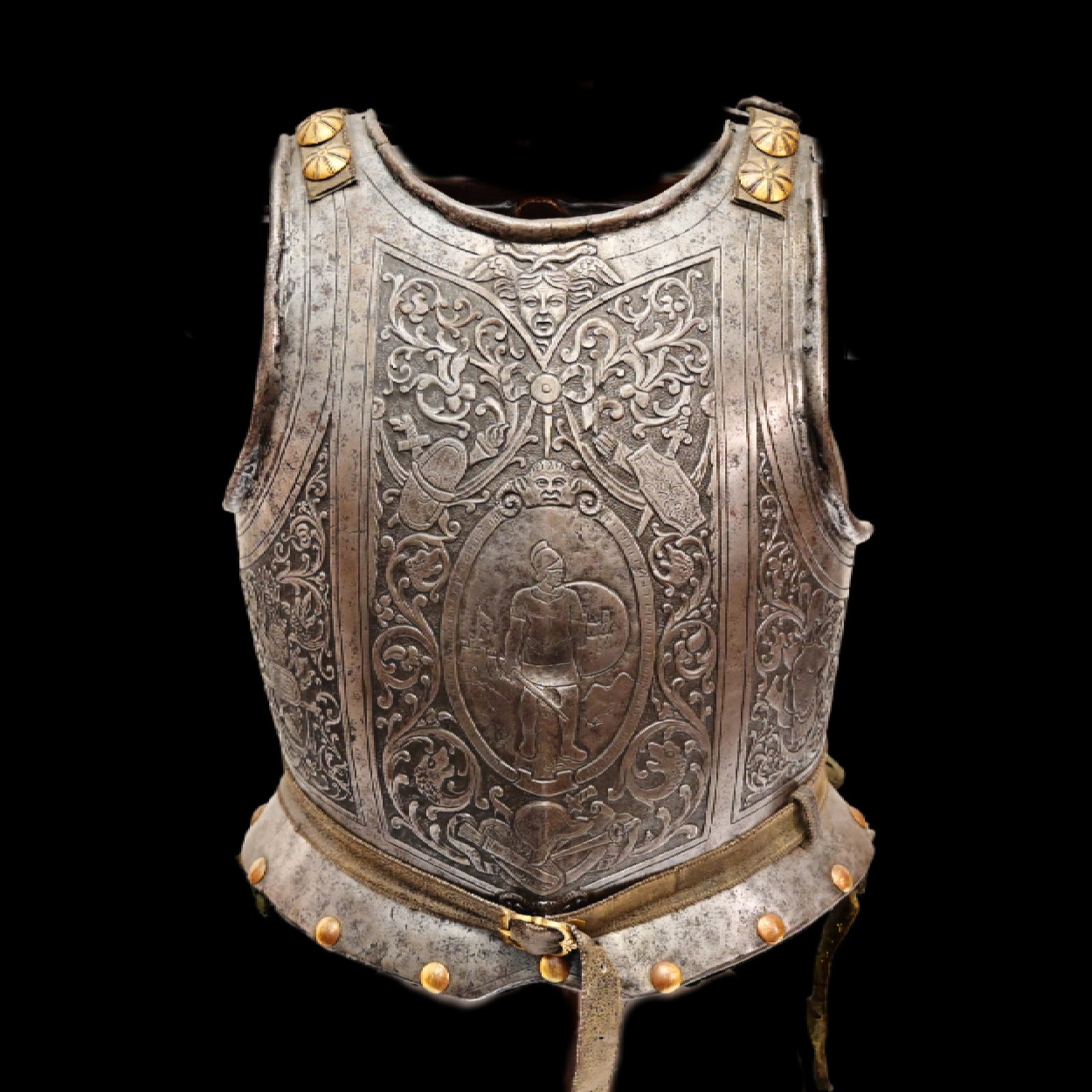 Magnificent Forged Steel Armor Breast Plate and Similar Back Plate, Italy 17th century.: Magnificent Forged Steel Armor Breast Plate and Similar Back Plate, Italy 17th century. The breast plate with a soldier in the central medallion surrounded by objects of war, brass rivets along the bo