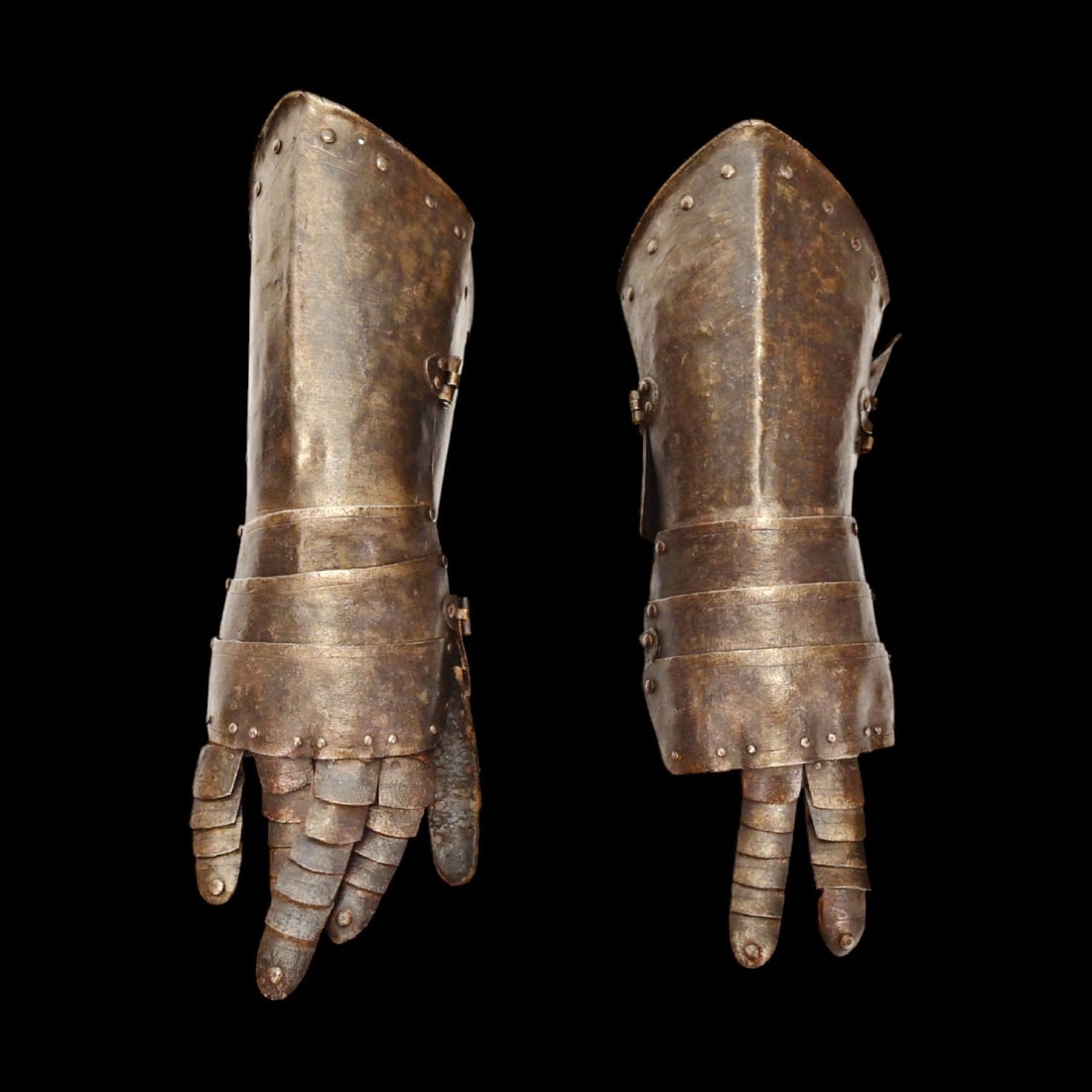A pair of original forged gloves from a 16th century suit of armor. Western Europe. (1 of 15)