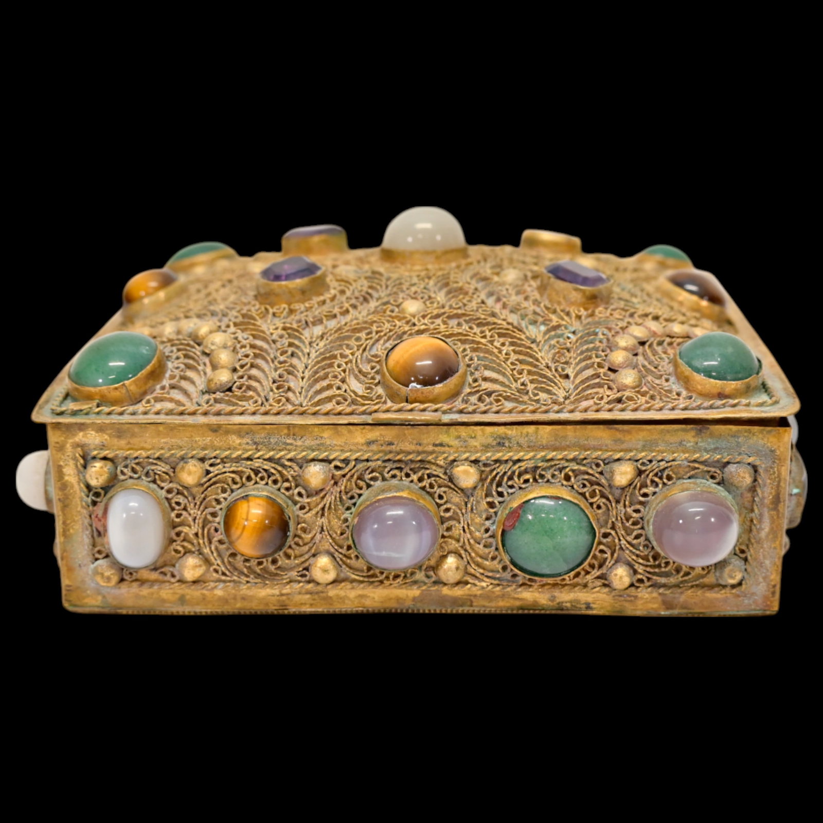Gilded Filigree Jewelry Box with Semi-Precious Stones, Middle East, 19th Century.: Gilded Filigree Jewelry Box with Semi-Precious Stones, Middle East, 19th Century. An exquisite 19th-century Middle Eastern gilt metal box, richly decorated in fine filigree work and adorned with a var