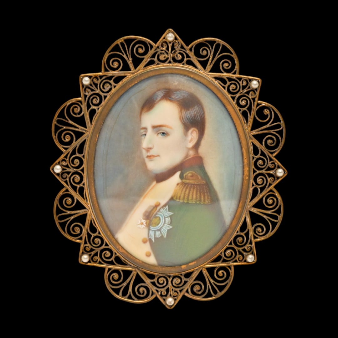 Miniature hand painted portrait on bone, depicting a Napoleon I, France, early 19th century.: Miniature hand painted portrait on bone, depicting a Napoleon I, drawn during his lifetime. France, early 19th century. The bronze, gilded, openwork frame is decorated with pearls. Velvet lining on th