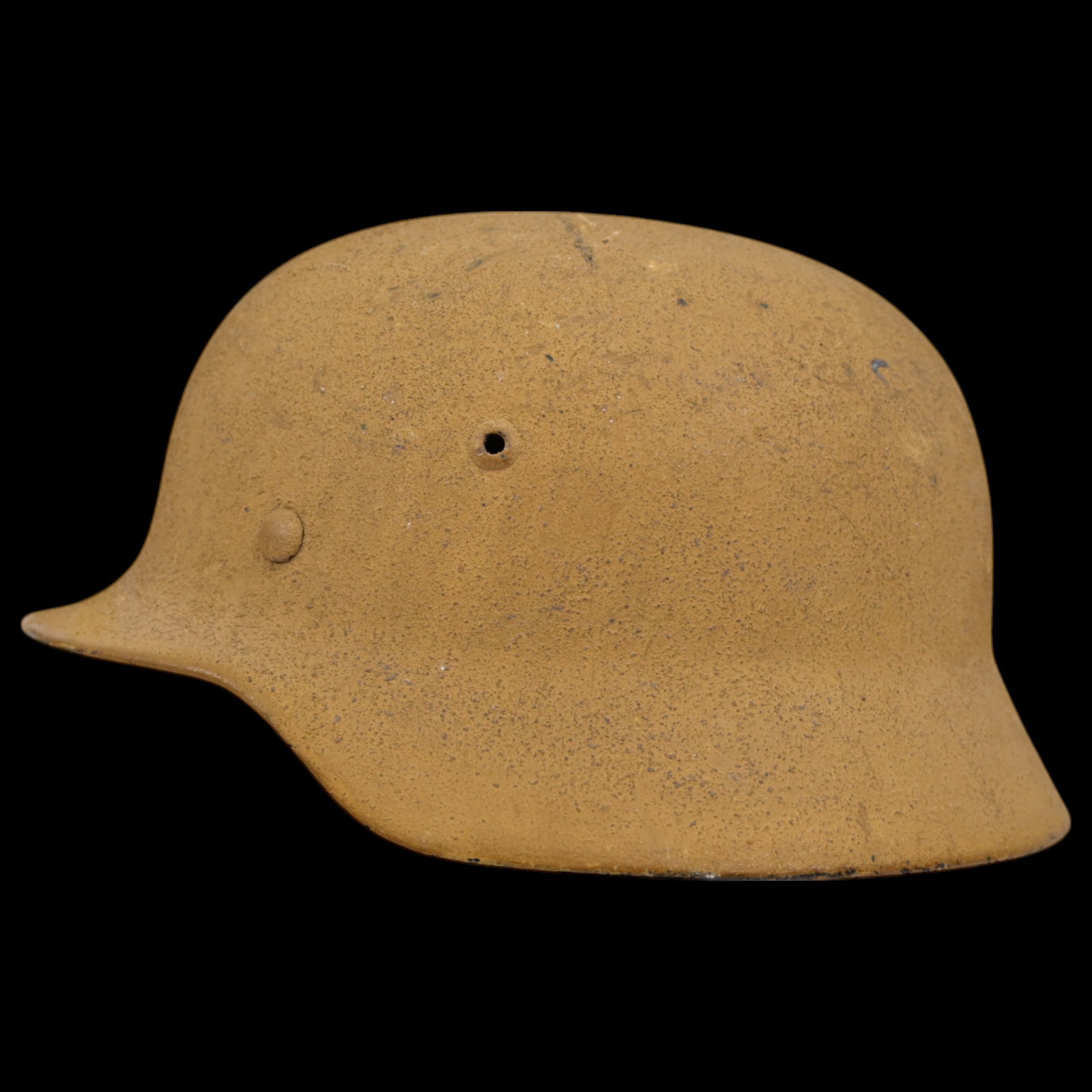 WWII Nazi German M40 Helmet, featuring original sand camouflage.: WWII Nazi German M40 Helmet, featuring original sand camouflage. This helmet bears the authenticity of wartime use, with the camouflage adding an extra layer of historical significance. The liner rema