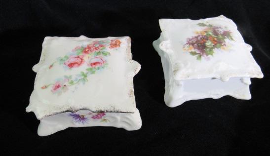 Pair of Antique Porcelain Trinket Jewelry Boxes: hand painted floral accents, hallmarked with an 8 point start pattern embossed on each base. approx 3-1/2" L x 3-1/2" W x 1-1/2" H