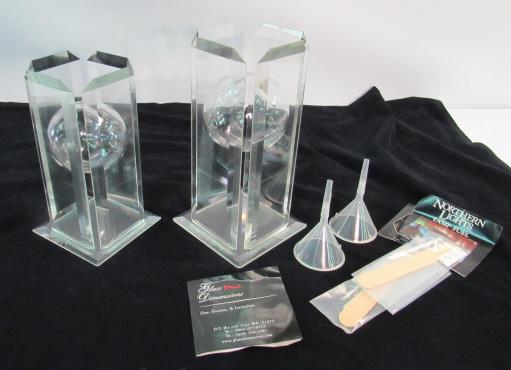 (2) Glass Dimensions Starfire Oil Lamps: Made in Essex, Massachusetts; company was in business from 1975-2010. These oil lamps are unused and in their original boxes.