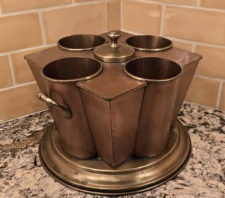 Center compartment lid lifts for easy filling of ice to keep (4) bottles chilled. 13" x 7-1/2"; Made