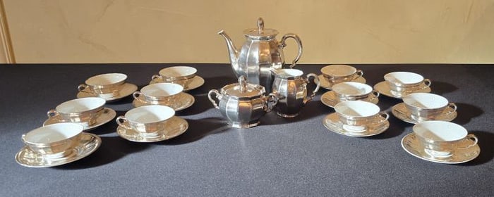 Teapot, Cream & Sugar are Marked Sterling Silver on Porcelain 21; (12) Teacups & Saucers are Marked