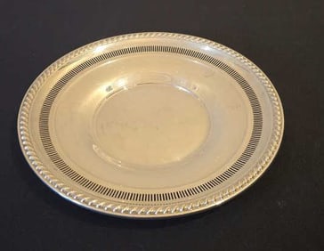Marked Roger Sterling 202 21, 9-1/8", 128 Grams