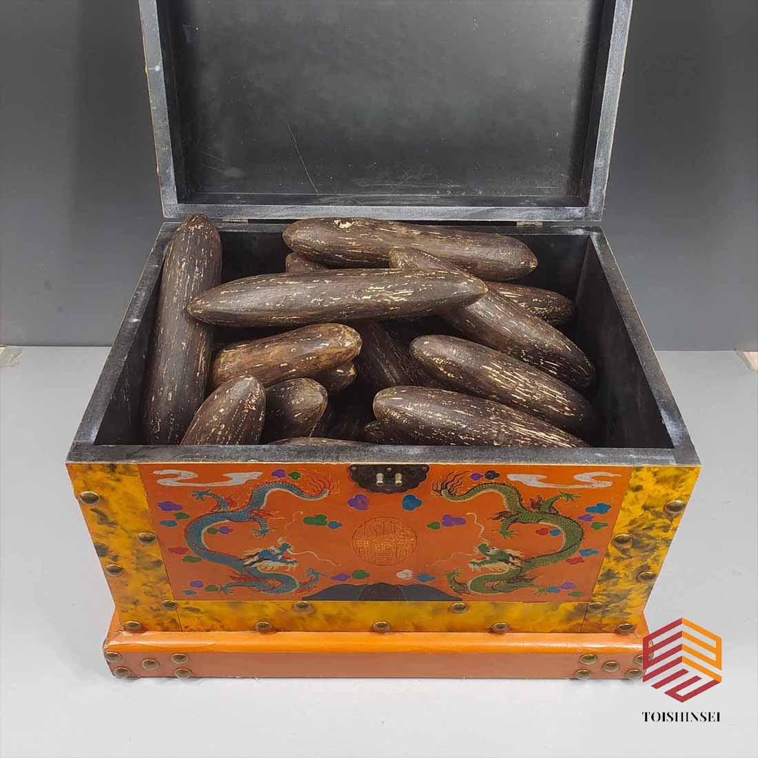 A box of small agarwood logs: A box of small agarwood logs