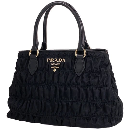 Prada Logo Tote Bag 2WAY Shoulder Bag Gathered Tote Bag Nylon Nero (Black) Women [Second Hand]: Prada Logo Tote 2WAY Shoulder Bag Gathered Tote Nylon Nero (Black) Women [Second-hand] Unverified No Returns or Exchanges Width about 30 cm Height about 18 cm Depth about 14 cm Material: Nylon, Leathe