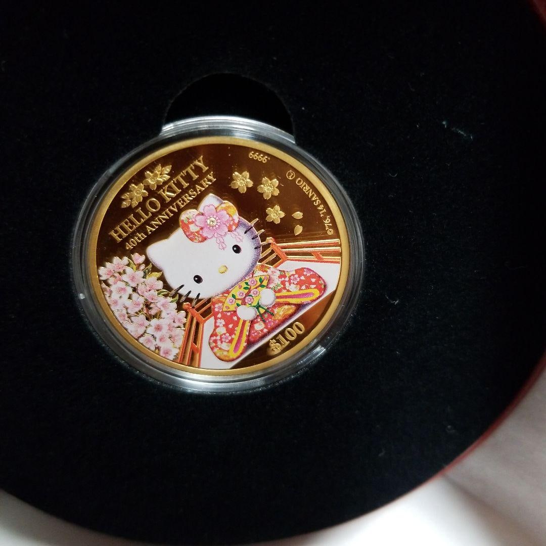 Hello Kitty 40th Anniversary Gold and Silver Coins and 30th Anniversary Silver Coin Set: Hello Kitty 40th Anniversary Gold and Silver Coins and 30th Anniversary Silver Coin Set.The silver coin features Hello Kitty in traditional Japanese clothing, admiring Japan's symbols, Mount Fuji and